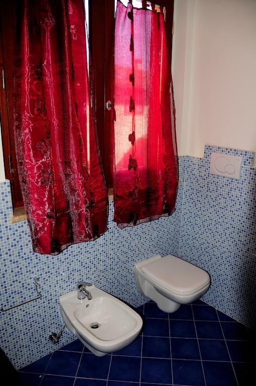 I Portici Appartamenti Marina di Grosseto Bilik gambar