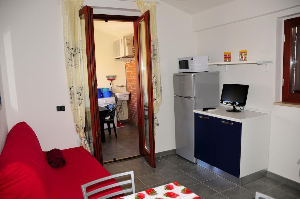 I Portici Appartamenti Marina di Grosseto Bilik gambar